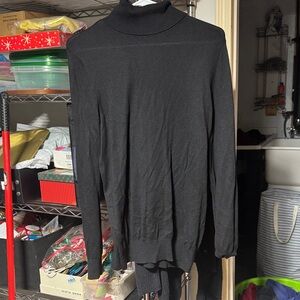 Woman’s Black Turtleneck Sweater